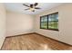 Bedroom with wood-look floors and a window that allows natural light at 7607 9Th Avenue Nw Dr, Bradenton, FL 34209