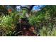 Lush garden with various plants and flowers at 7607 9Th Avenue Nw Dr, Bradenton, FL 34209