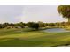 Peaceful golf course view with a rainbow in the sky at 5449 Downham Mdws, Sarasota, FL 34235