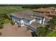 Luxury home with attached garage and golf course view at 7390 Divot Loop, Lakewood Ranch, FL 34202