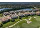 Community view showcasing homes and a golf course at 7390 Divot Loop, Lakewood Ranch, FL 34202