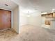 Combined dining and living room with access to kitchen at 2587 Countryside Blvd # 6111, Clearwater, FL 33761