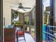 Enclosed patio with table and chairs, perfect for outdoor dining at 6157 Midnight Pass Rd # A51, Sarasota, FL 34242