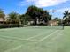 Well-maintained tennis court for residents' enjoyment at 6157 Midnight Pass Rd # A51, Sarasota, FL 34242