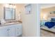 Bathroom vanity with a mirror and plenty of counter space at 6157 Midnight Pass Rd # A51, Sarasota, FL 34242
