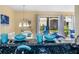 Kitchen features granite countertops and teal-colored dishware at 6157 Midnight Pass Rd # A51, Sarasota, FL 34242