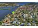 Aerial view showcasing the property's waterfront location and community at 6157 Midnight Pass Rd # A51, Sarasota, FL 34242