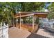 Relaxing hot tub on deck with covered pergola at 1332 3Rd W Ave, Bradenton, FL 34205