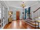 Bright entryway with hardwood floors and stained-glass door at 1332 3Rd W Ave, Bradenton, FL 34205