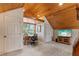 Home office with wood ceiling, built-in desk and large window at 1332 3Rd W Ave, Bradenton, FL 34205