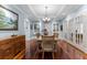 Formal dining room with hardwood floors, chandelier, and wooden table at 1332 3Rd W Ave, Bradenton, FL 34205