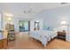 Spacious bedroom with access to private patio at 6935 Arbor Oaks Cir, Bradenton, FL 34209