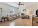 Living room with hardwood floors and lots of natural light at 6935 Arbor Oaks Cir, Bradenton, FL 34209