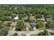 Aerial view of a residential neighborhood with houses and trees at 6935 Arbor Oaks Cir, Bradenton, FL 34209