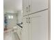 Clean bathroom with shower, white cabinets and dark countertop at 303 48Th W St, Bradenton, FL 34209