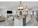 Spacious kitchen island with seating and stainless steel appliances at 303 48Th W St, Bradenton, FL 34209