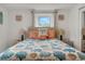 Serene bedroom with a queen-size bed and coastal decor, creating a relaxing atmosphere at 303 48Th W St, Bradenton, FL 34209