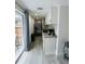 Modern kitchen features stainless steel appliances and light cabinets at 303 48Th W St, Bradenton, FL 34209