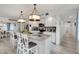 Open concept kitchen with large island and breakfast bar at 303 48Th W St, Bradenton, FL 34209