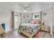 Bright bedroom with a coastal theme, featuring a comfortable bed and built-in storage at 303 48Th W St, Bradenton, FL 34209