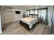 Bright bedroom with a comfortable bed and plenty of natural light at 303 48Th W St, Bradenton, FL 34209