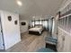Bright bedroom with a queen bed and plenty of natural light at 303 48Th W St, Bradenton, FL 34209