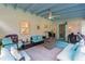 Relaxing outdoor patio with seating area and fire pit at 303 48Th W St, Bradenton, FL 34209