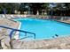 Refreshing community pool with ample deck space at 2564 Clubhouse Cir # 204, Sarasota, FL 34232