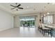 Living area showcasing pool and lanai views at 12734 Rainwashed Loop, Parrish, FL 34219