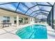 Inviting screened pool area with patio furniture at 12734 Rainwashed Loop, Parrish, FL 34219