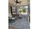 The home features a screened patio with outdoor furniture and a ceiling fan at 3653 Bonaventure Ct, Sarasota, FL 34243