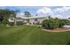 Single-story home with landscaped yard and two-car garage at 3653 Bonaventure Ct, Sarasota, FL 34243