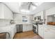 Bright kitchen features stainless steel appliances and ample counter space at 3653 Bonaventure Ct, Sarasota, FL 34243