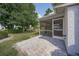 Relaxing patio area with brick pavers, adjacent to the house and backyard at 3653 Bonaventure Ct, Sarasota, FL 34243