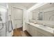 Bathroom with a double vanity, shower, and toilet at 3653 Bonaventure Ct, Sarasota, FL 34243