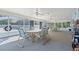 Community room with tables, chairs, and a view of the pool at 3653 Bonaventure Ct, Sarasota, FL 34243