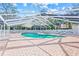 Relaxing community pool area with covered seating and lounge chairs at 3653 Bonaventure Ct, Sarasota, FL 34243