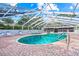 Community pool and spa with covered patio and lounge chairs at 3653 Bonaventure Ct, Sarasota, FL 34243