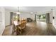 Spacious living room with sliding doors leading to patio at 3653 Bonaventure Ct, Sarasota, FL 34243