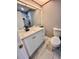 Updated bathroom with white vanity, marble shower, and new toilet at 1111 Longfellow Rd # 1111, Sarasota, FL 34243