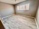 Simple bedroom with tile flooring and a ceiling fan at 1111 Longfellow Rd # 1111, Sarasota, FL 34243