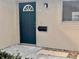 Neat exterior with a dark green front door and mailbox at 1111 Longfellow Rd # 1111, Sarasota, FL 34243