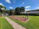 playground with swings and play area at 1111 Longfellow Rd # 1111, Sarasota, FL 34243