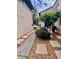 Landscaped front yard with walkway and garden at 1111 Longfellow Rd # 1111, Sarasota, FL 34243
