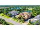 Luxury home with lake views in a gated community at 7546 Divot Loop, Lakewood Ranch, FL 34202