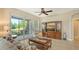 Comfortable living area with access to a patio at 7546 Divot Loop, Lakewood Ranch, FL 34202