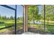 Enjoy the peaceful pond view from this screened patio at 7546 Divot Loop, Lakewood Ranch, FL 34202