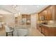 Modern kitchen with granite countertops and stainless steel appliances at 7546 Divot Loop, Lakewood Ranch, FL 34202