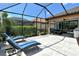 Covered patio with comfortable seating and shade at 8744 Bellussi Dr, Sarasota, FL 34238