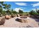 Gather around the fire pit with seating for community events at 8744 Bellussi Dr, Sarasota, FL 34238